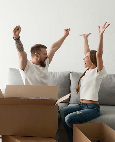 happy couple in new home